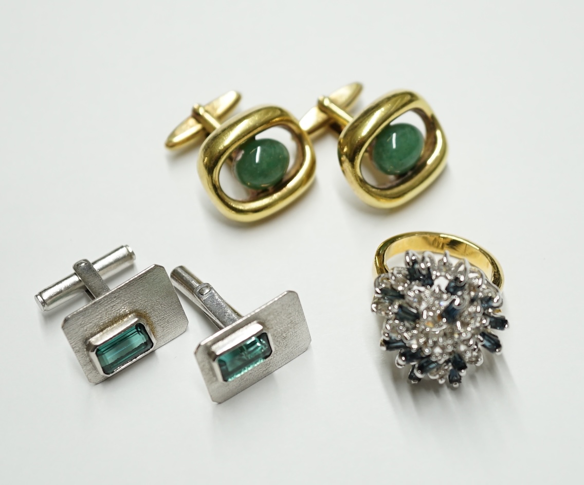 A pair of Lanvin gold plated cufflinks, each set with an oval green cabochon, a pair of silvered metal cufflinks set green stones and a costume ring. Condition - fair